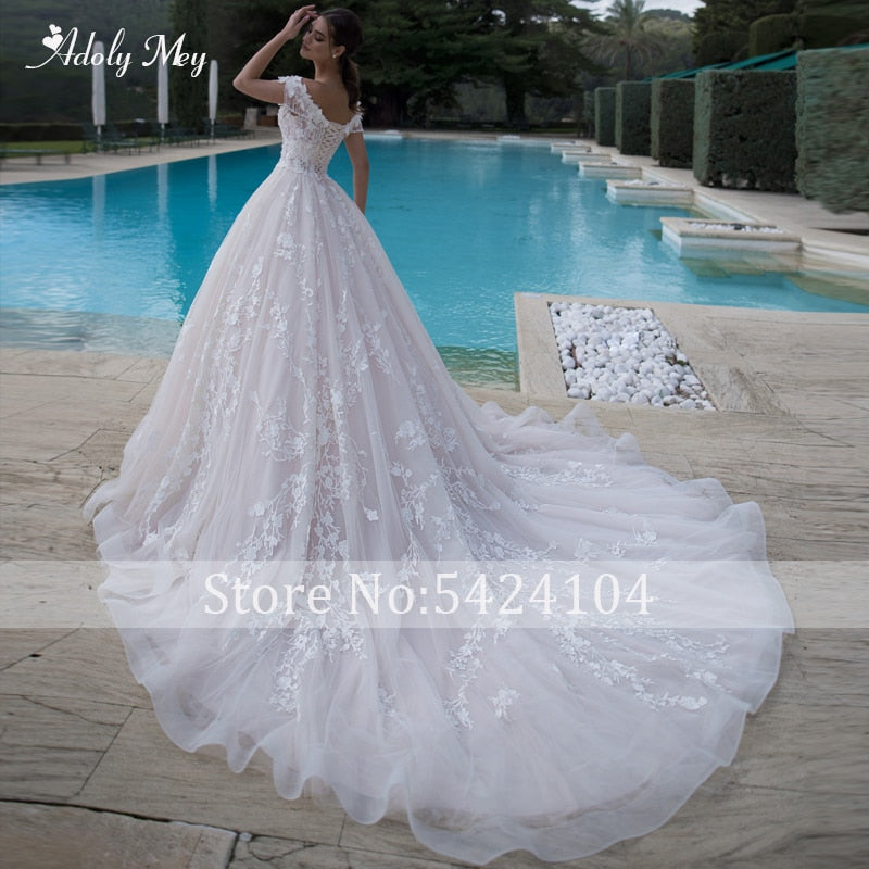 Adoly Mey Gorgeous Appliques Flowers A-Line Wedding Dresses 2021 Luxury Beaded Boat Neck Lace Up Princess Bridal Gown Plus Size