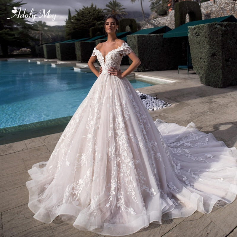 Adoly Mey Gorgeous Appliques Flowers A-Line Wedding Dresses 2021 Luxury Beaded Boat Neck Lace Up Princess Bridal Gown Plus Size