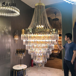 Crystal chandelier in the living room of duplex villa, spiral staircase chandelier, modern luxury living room chandelier