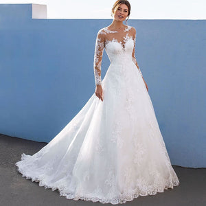 Sexy Lace Long Sleeve Wedding Dress Ball Gown 2022 Elegant Appliques Bridal Gown Sheer Neck Illusion Tulle Button Sweep Train