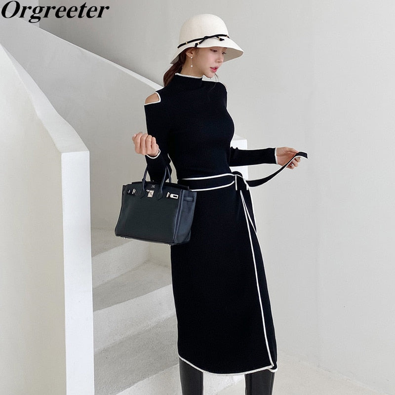 High-quality Shoulder Hollow Long Sleeve Black Knitted Dress White Striped Trim Sashes Bow Slim Split Mid-length Sweater Dress